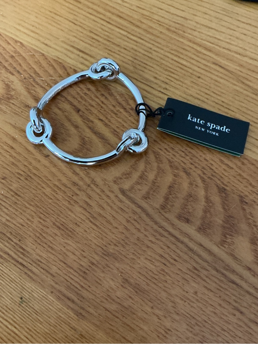kate spade silver interlock knot bangle bracelet
